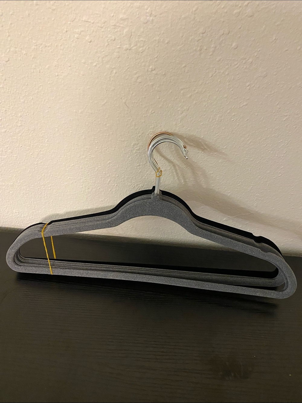 7 black and grey velvet hangers